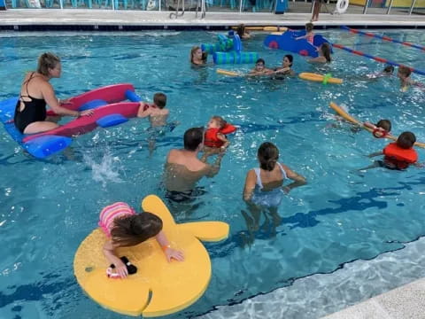 a group of people in a pool