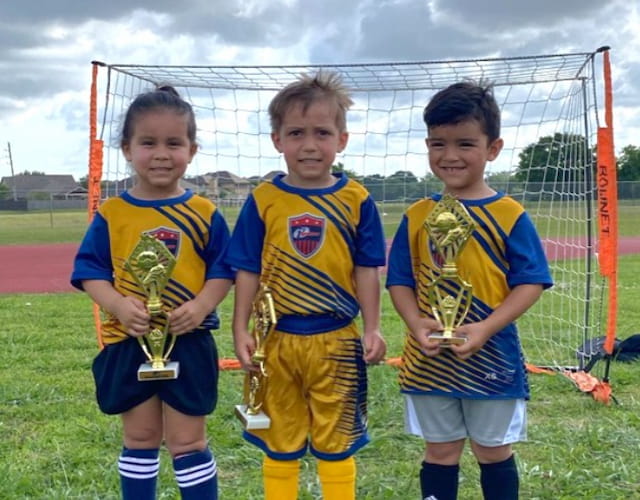 a group of boys in football uniforms