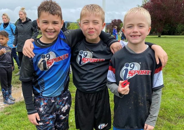 a group of boys posing for a picture