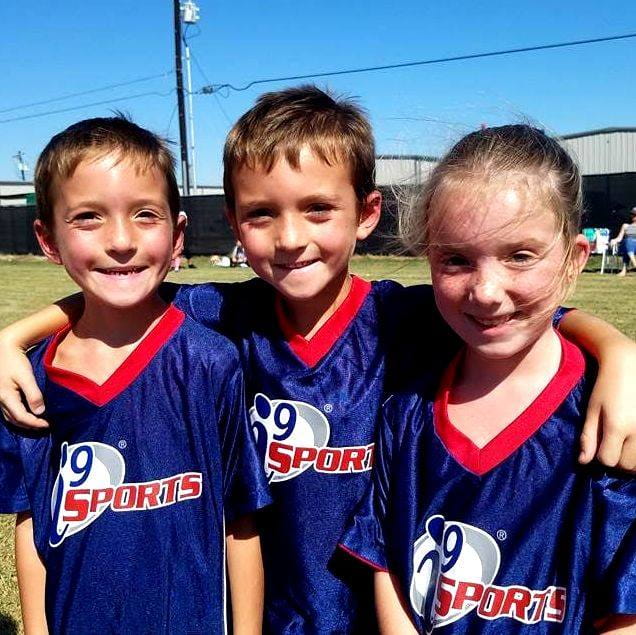 a group of boys posing for a picture
