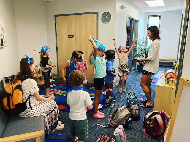 a group of children in a room