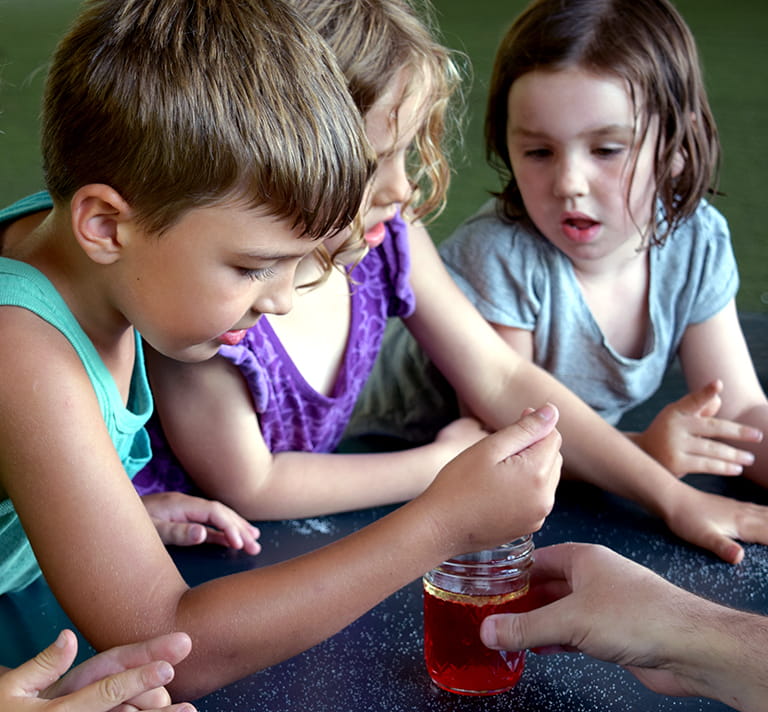 a few children playing with a toy
