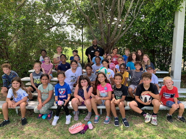 a group of people posing for a photo