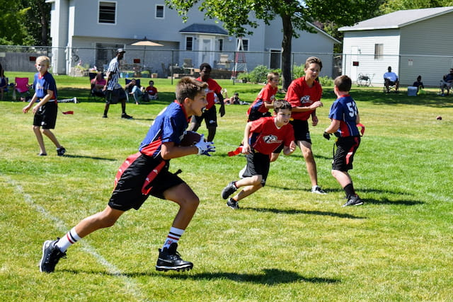 a group of boys playing football