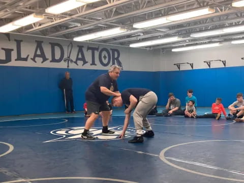 a group of people in a gym