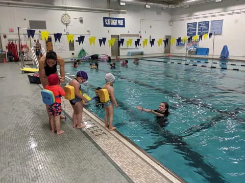 a group of people in a pool