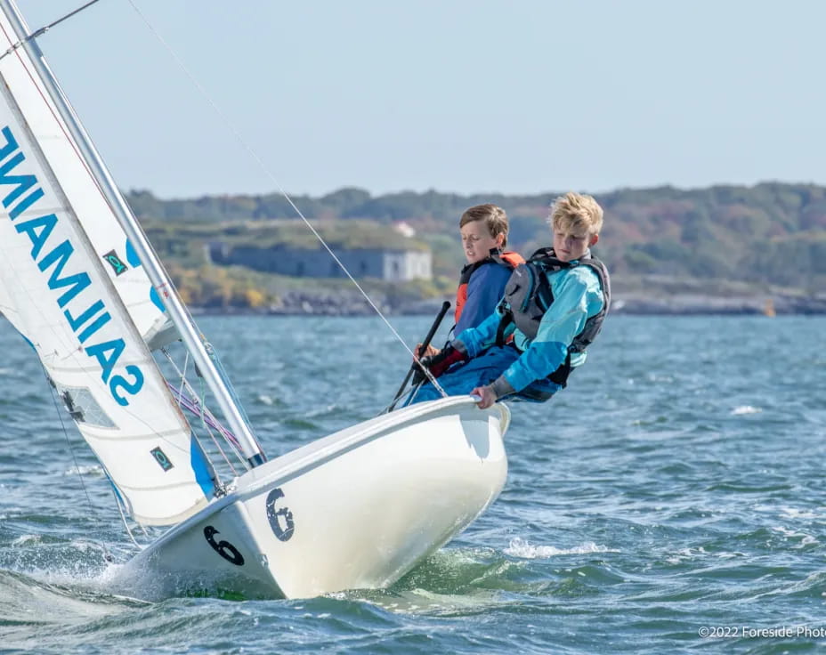 two people on a sailboat