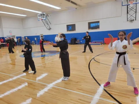 a group of people in a gym