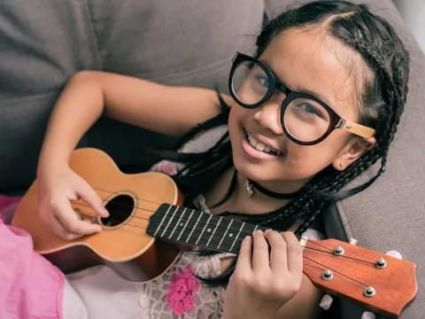 a person playing a guitar