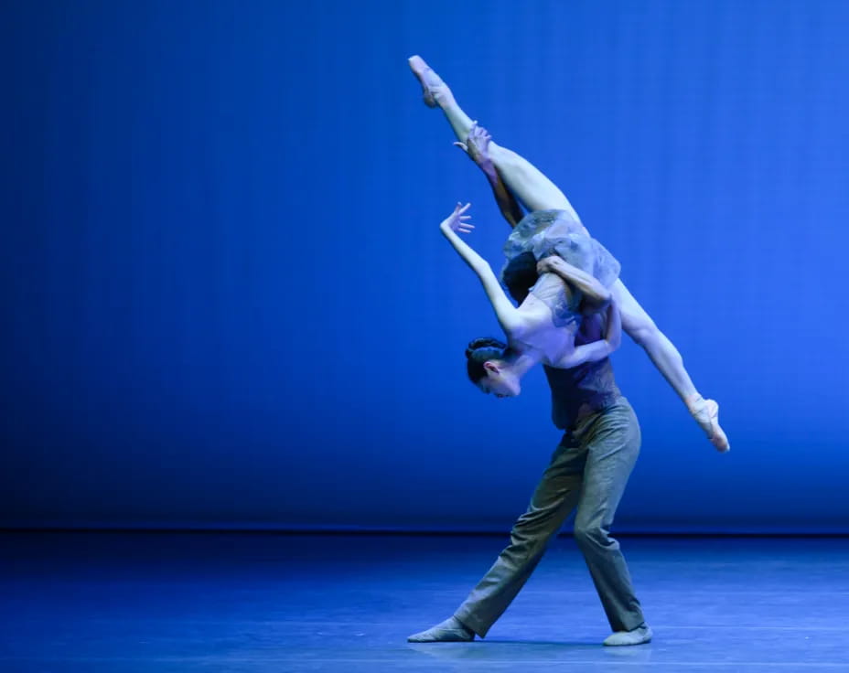 a man and woman dancing