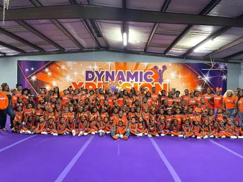 a group of people in a gym