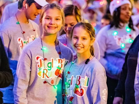 a couple of girls smiling