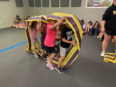 a group of people holding a flag