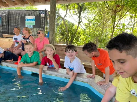 a group of people in a pool