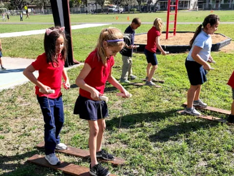 a group of kids playing in a park
