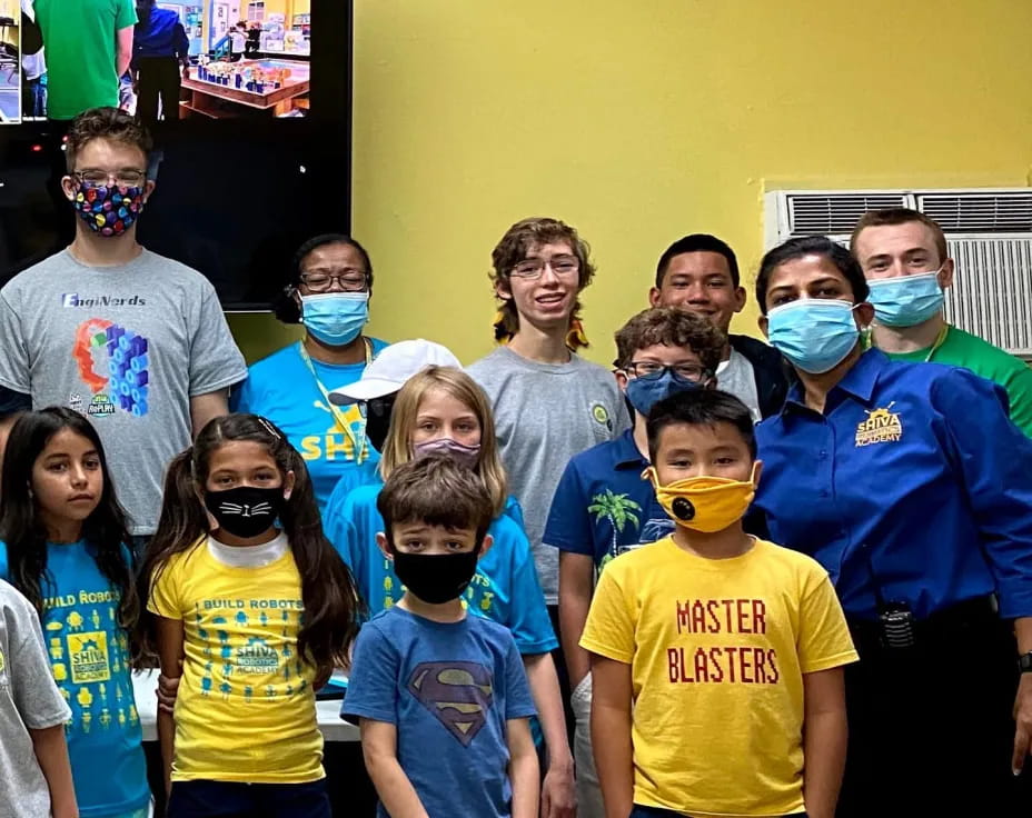 a group of people wearing masks