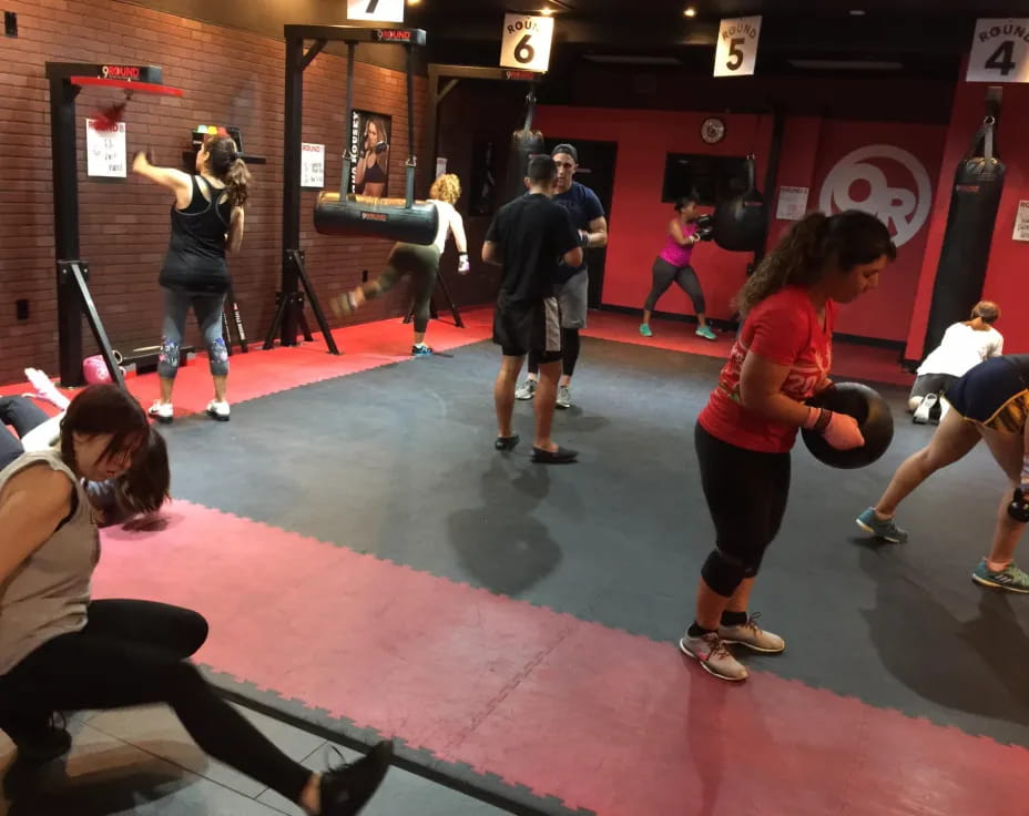 a group of people in a gym