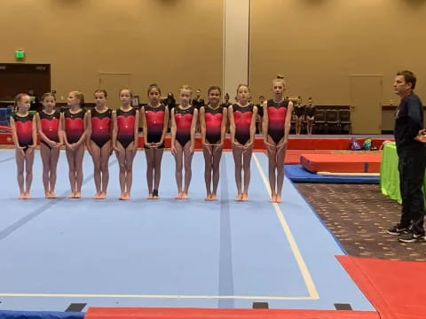 a group of people in a gym