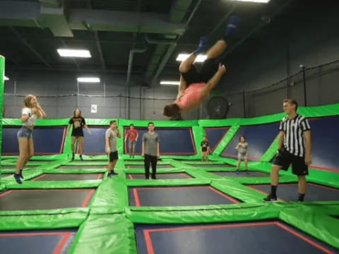 a group of people on a trampoline