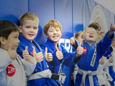 a group of boys in white shirts