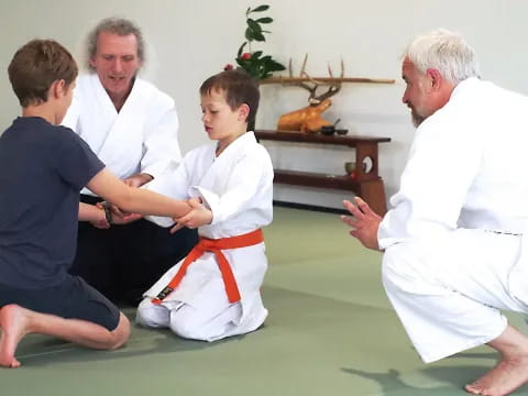 a group of people sitting on the floor