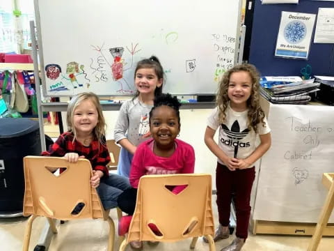 a group of children posing for a photo