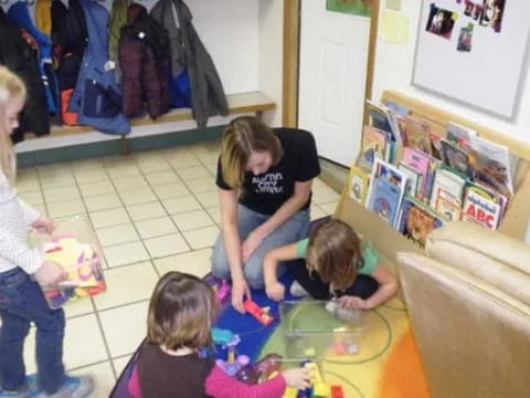 a person and children playing with toys