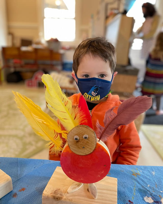 a boy wearing a garment