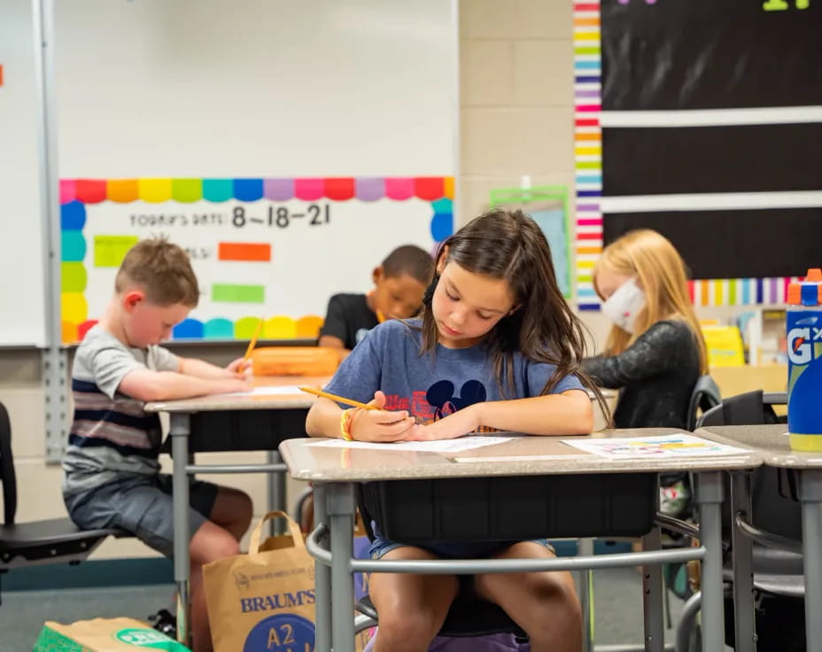 a group of people sitting at a table