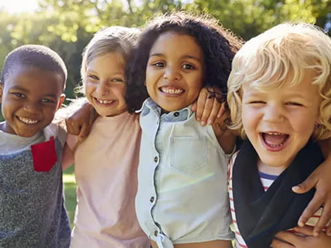 a group of children smiling