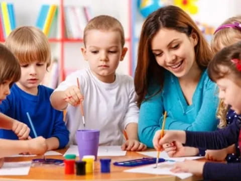 a teacher teaching her students