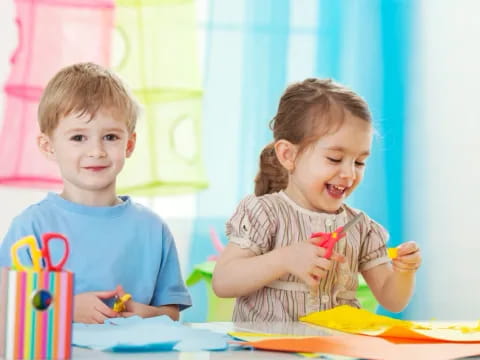 a couple of kids playing with toys
