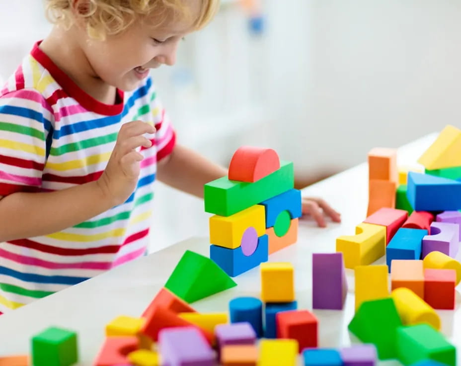 a child playing with blocks