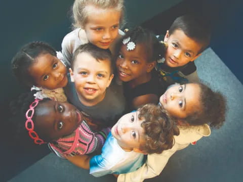 a group of children posing for a photo