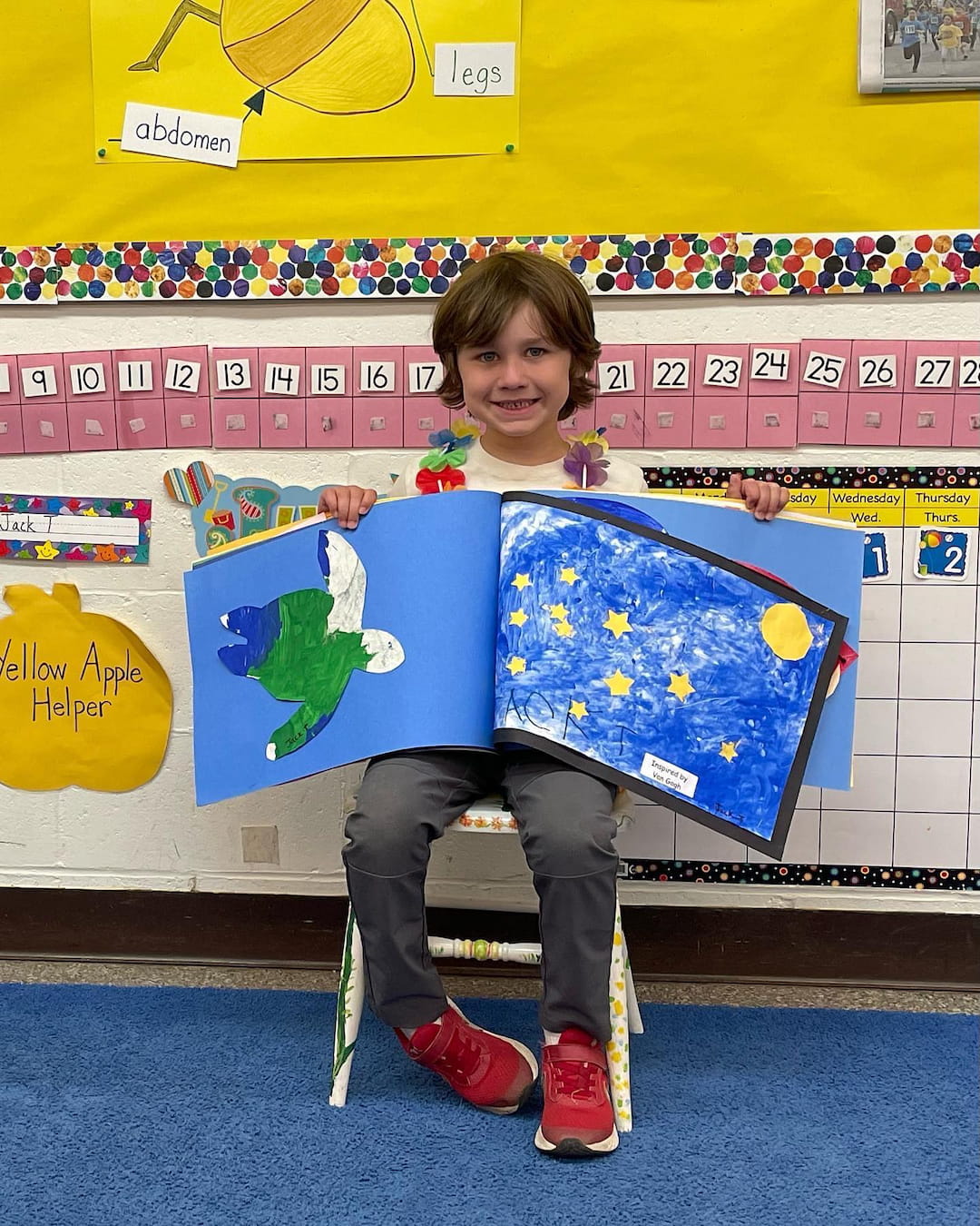 a boy holding a flag
