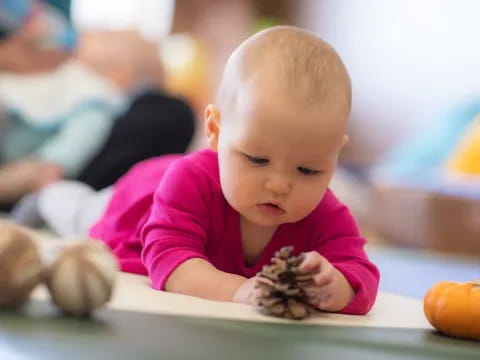 a baby crawling on a table
