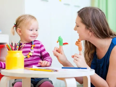a person and a child eating