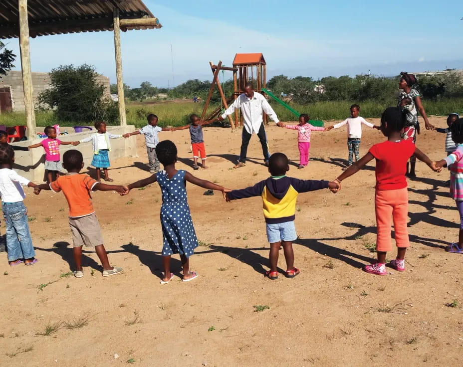 a group of children playing outside