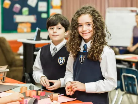 a person and a boy in uniform