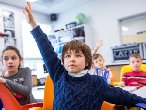 a group of children in a classroom