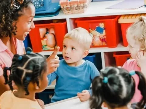 a person and several children