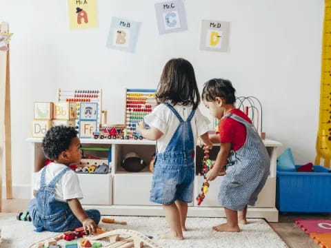 a group of children playing with toys