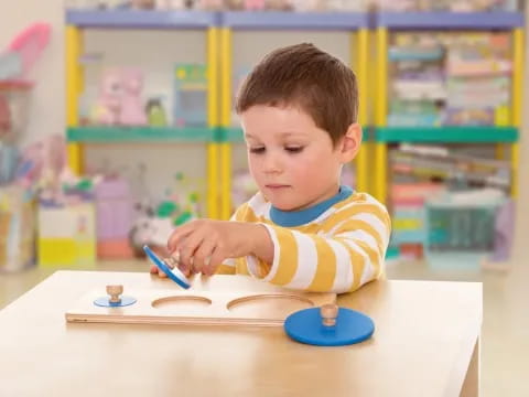 a child using a magnifying glass