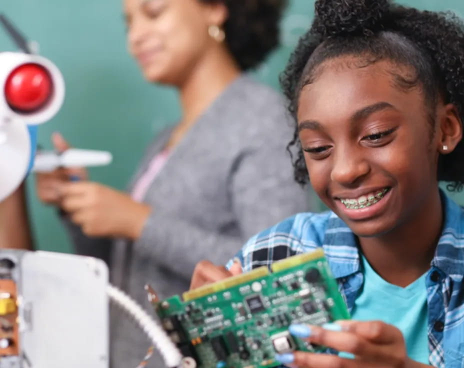 a person holding a green object