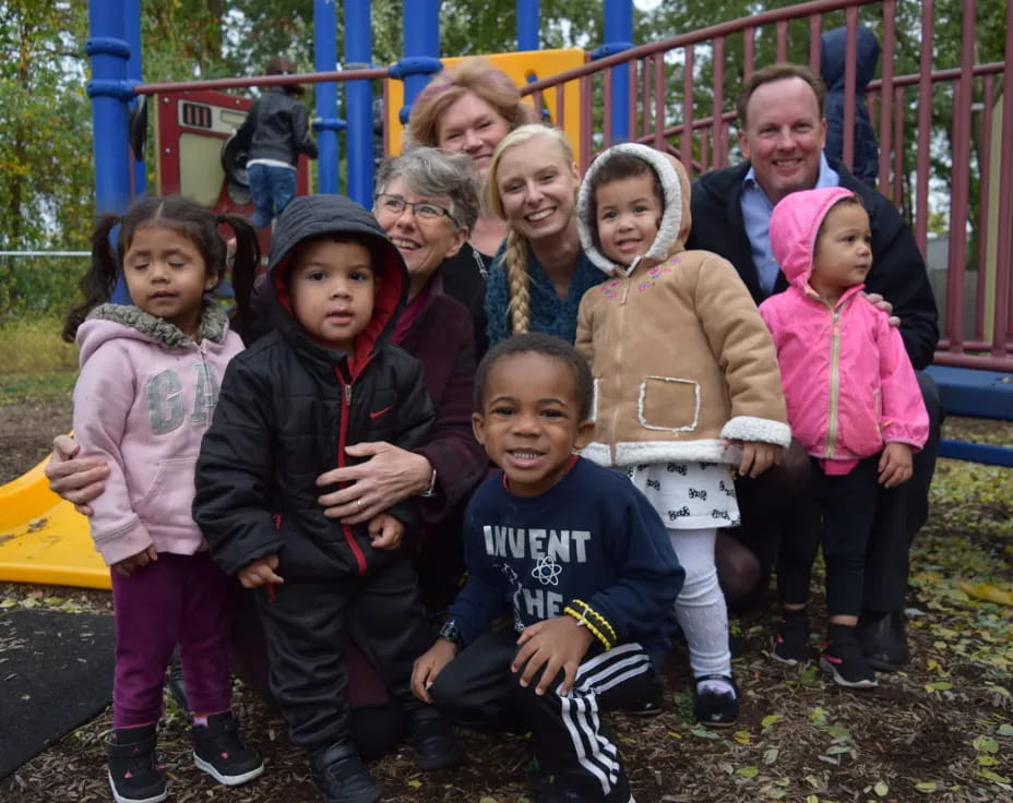 a group of people posing for a photo
