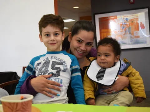 a person and two boys