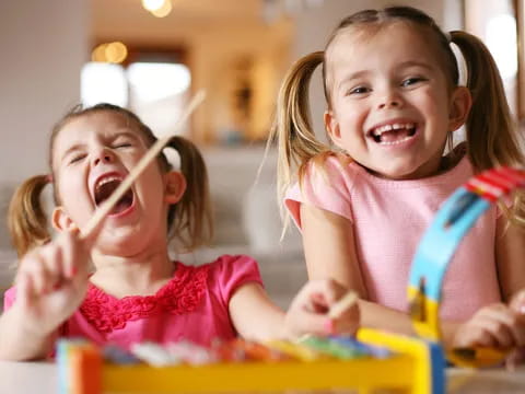 a few young girls laughing