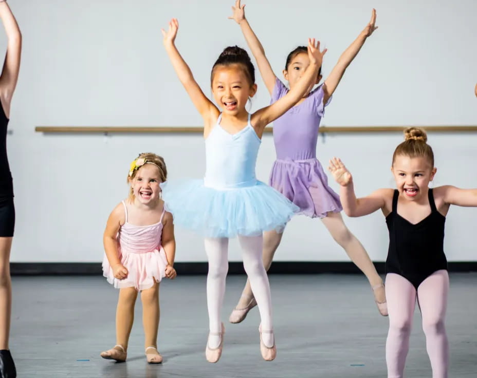 a group of girls dancing