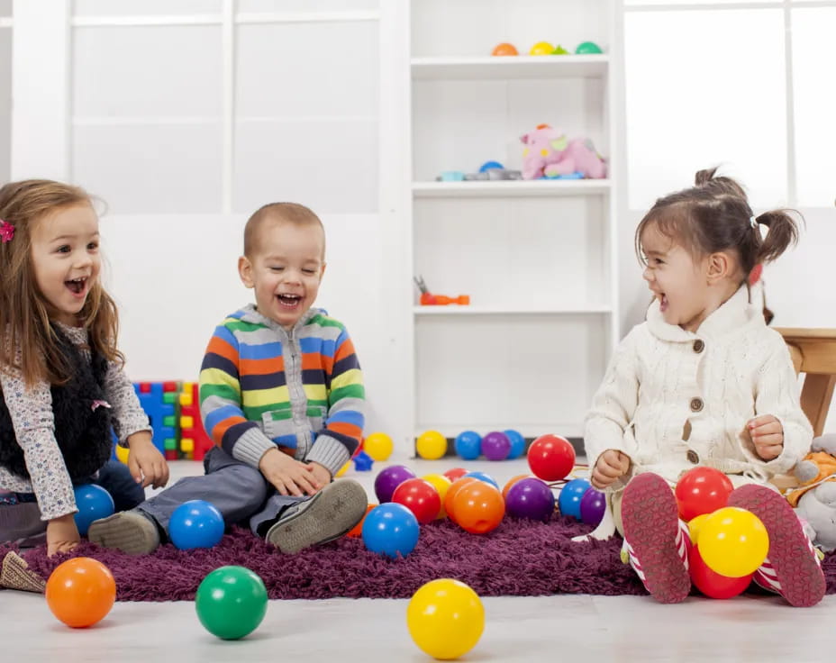 a group of children playing with balls