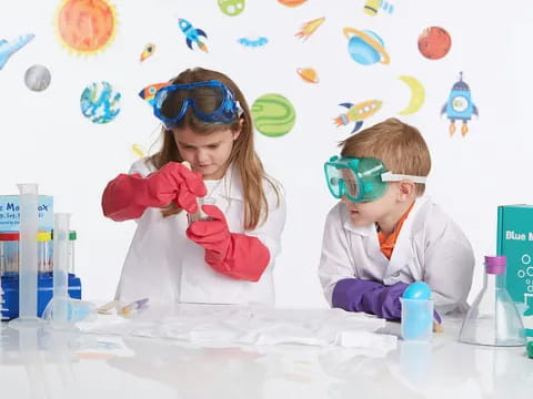 a couple of kids wearing goggles